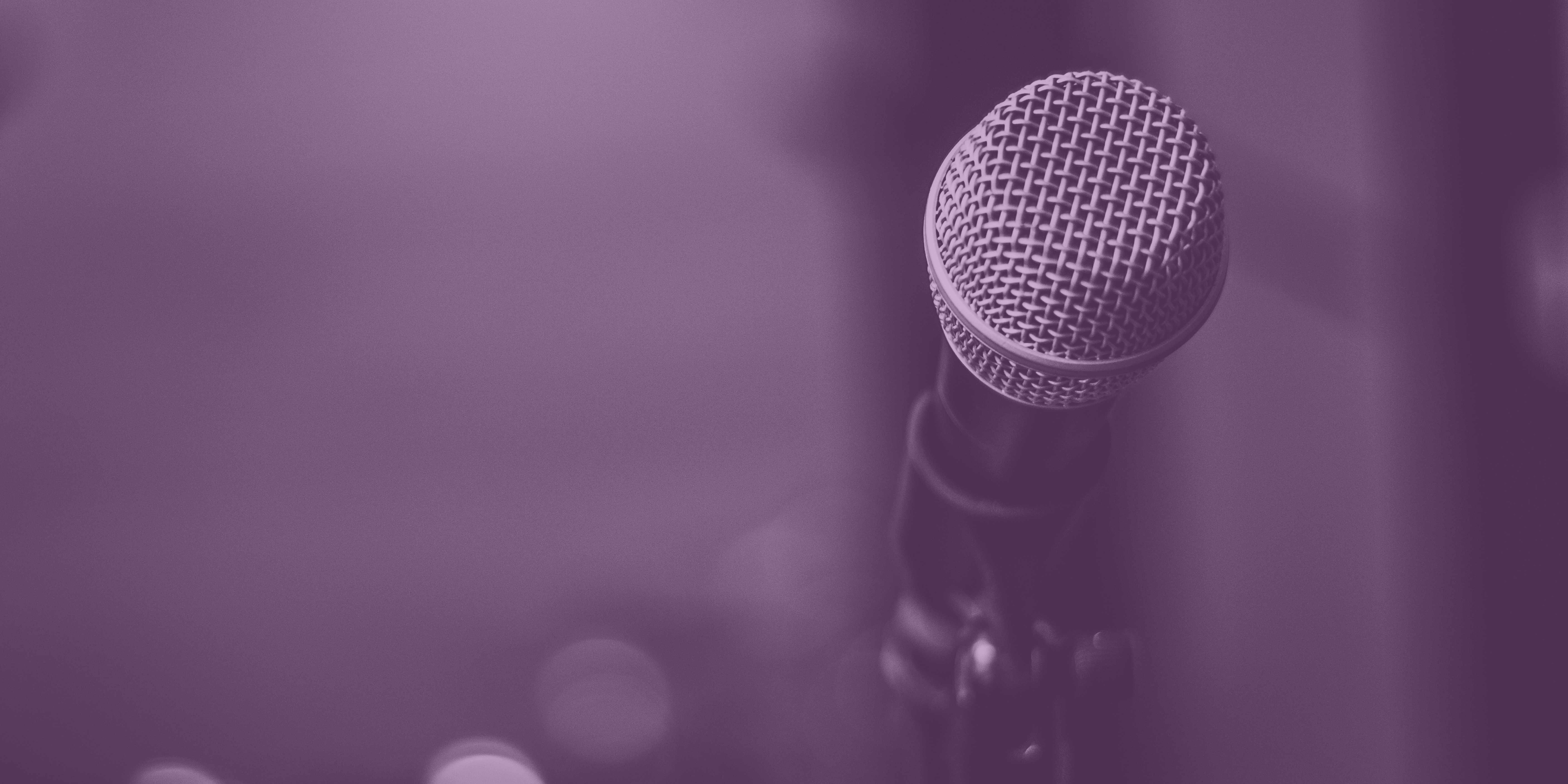 purple filtered image of microphone